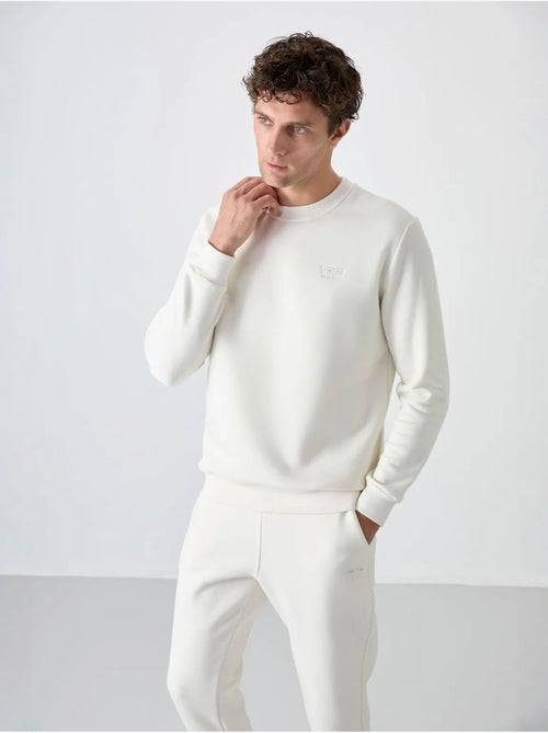Set da uomo di felpa in pile di cotone e poliestere con sweatshirt e pantaloni tommy - Kiabi Set da uomo di felpa in pile di cotone e poliestere con sweatshirt e pantaloni tommy - Kiabi