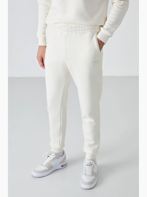 Set da uomo di felpa in pile di cotone e poliestere con sweatshirt e pantaloni tommy - Kiabi Set da uomo di felpa in pile di cotone e poliestere con sweatshirt e pantaloni tommy - Kiabi