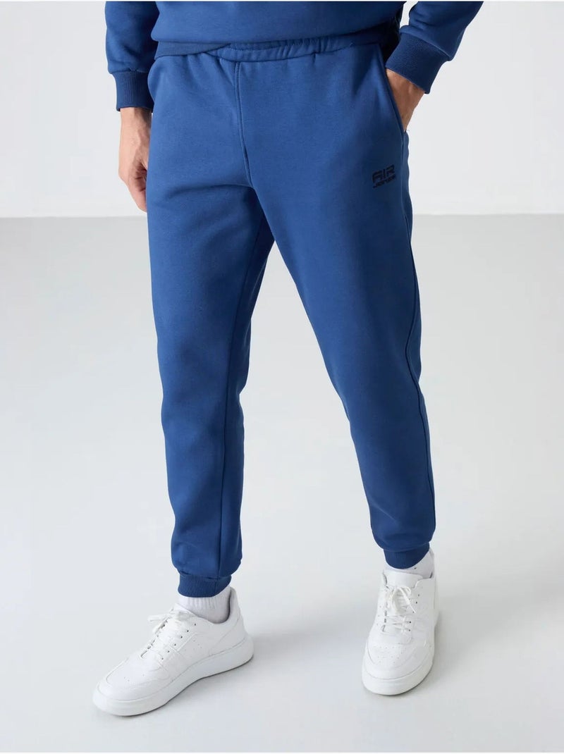 Set da uomo di felpa in pile di cotone e poliestere con sweatshirt e pantaloni tommy Blu - Kiabi