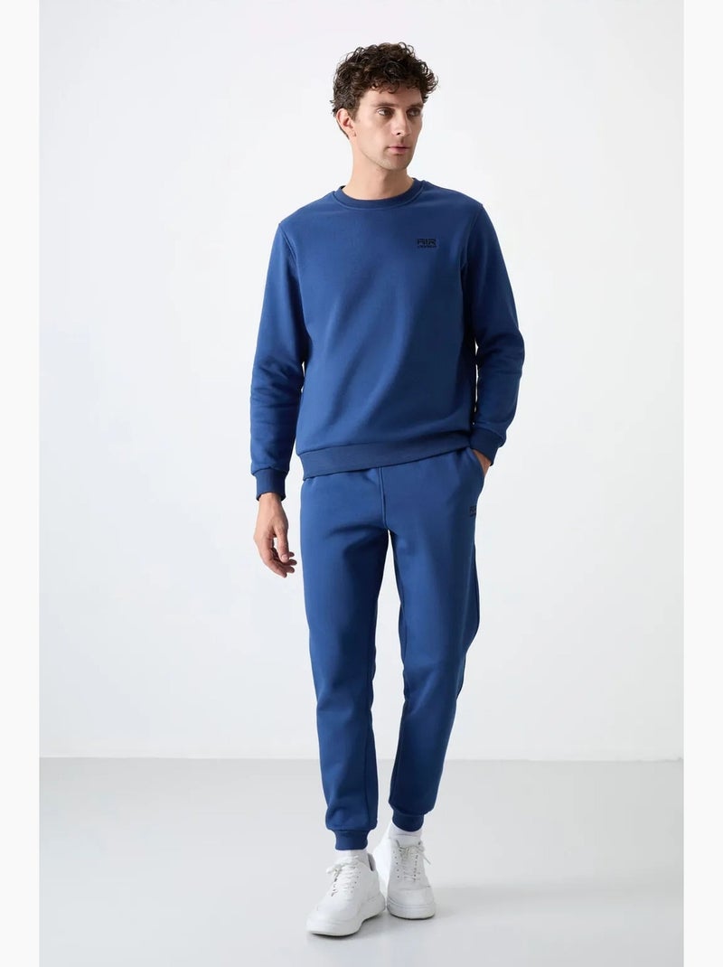 Set da uomo di felpa in pile di cotone e poliestere con sweatshirt e pantaloni tommy Blu - Kiabi