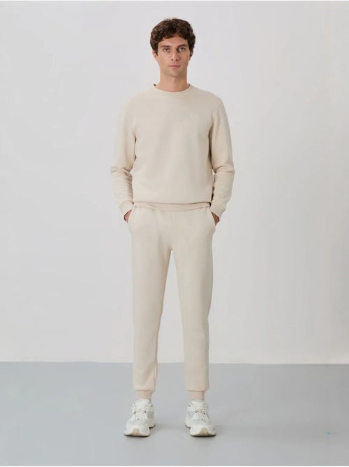 Set da uomo di felpa in pile di cotone e poliestere con sweatshirt e pantaloni tommy - Kiabi Set da uomo di felpa in pile di cotone e poliestere con sweatshirt e pantaloni tommy - Kiabi