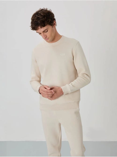 Set da uomo di felpa in pile di cotone e poliestere con sweatshirt e pantaloni tommy - Kiabi Set da uomo di felpa in pile di cotone e poliestere con sweatshirt e pantaloni tommy - Kiabi