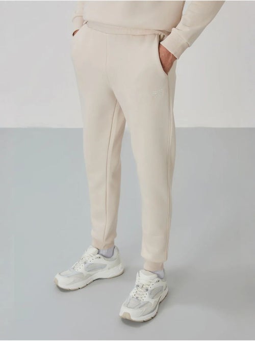 Set da uomo di felpa in pile di cotone e poliestere con sweatshirt e pantaloni tommy - Kiabi Set da uomo di felpa in pile di cotone e poliestere con sweatshirt e pantaloni tommy - Kiabi