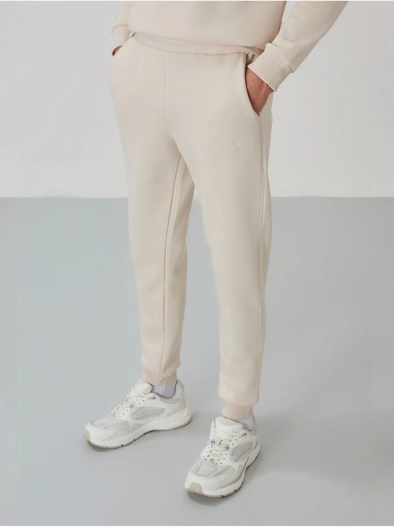 Set da uomo di felpa in pile di cotone e poliestere con sweatshirt e pantaloni tommy Ecru - Kiabi