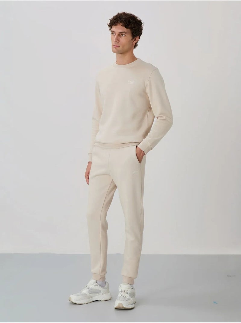 Set da uomo di felpa in pile di cotone e poliestere con sweatshirt e pantaloni tommy Ecru - Kiabi