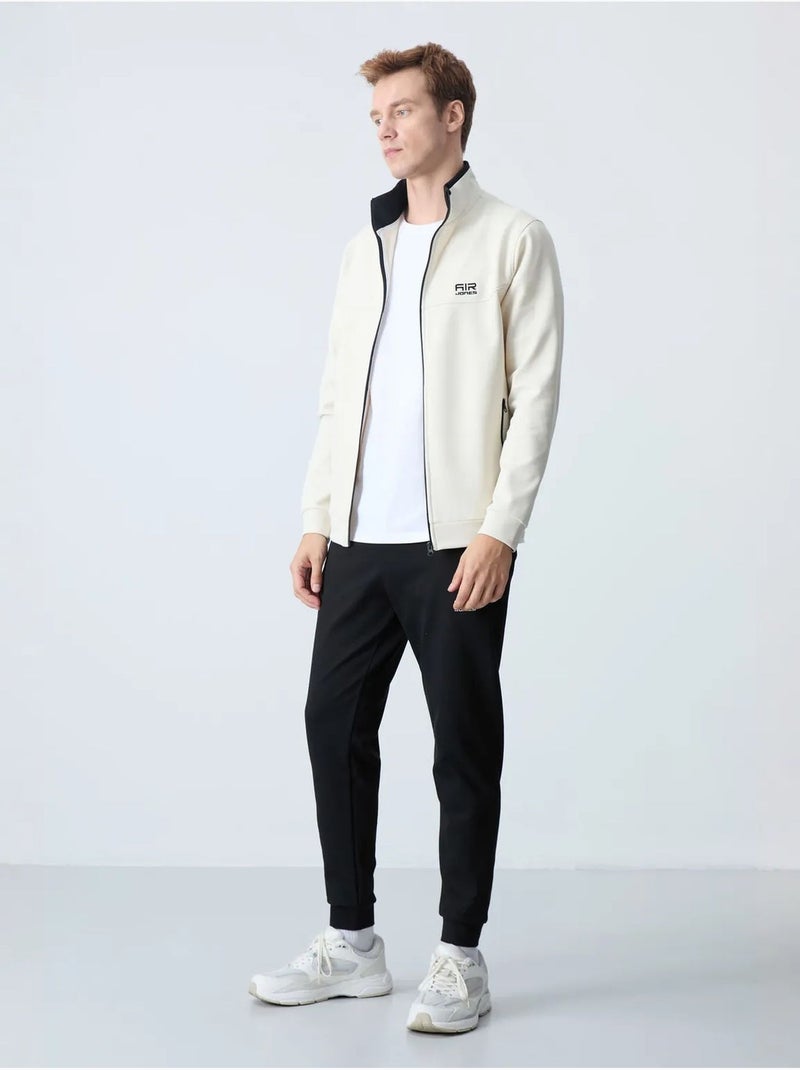 Set da uomo di felpa in pile e pantaloni tommy Avorio - Kiabi