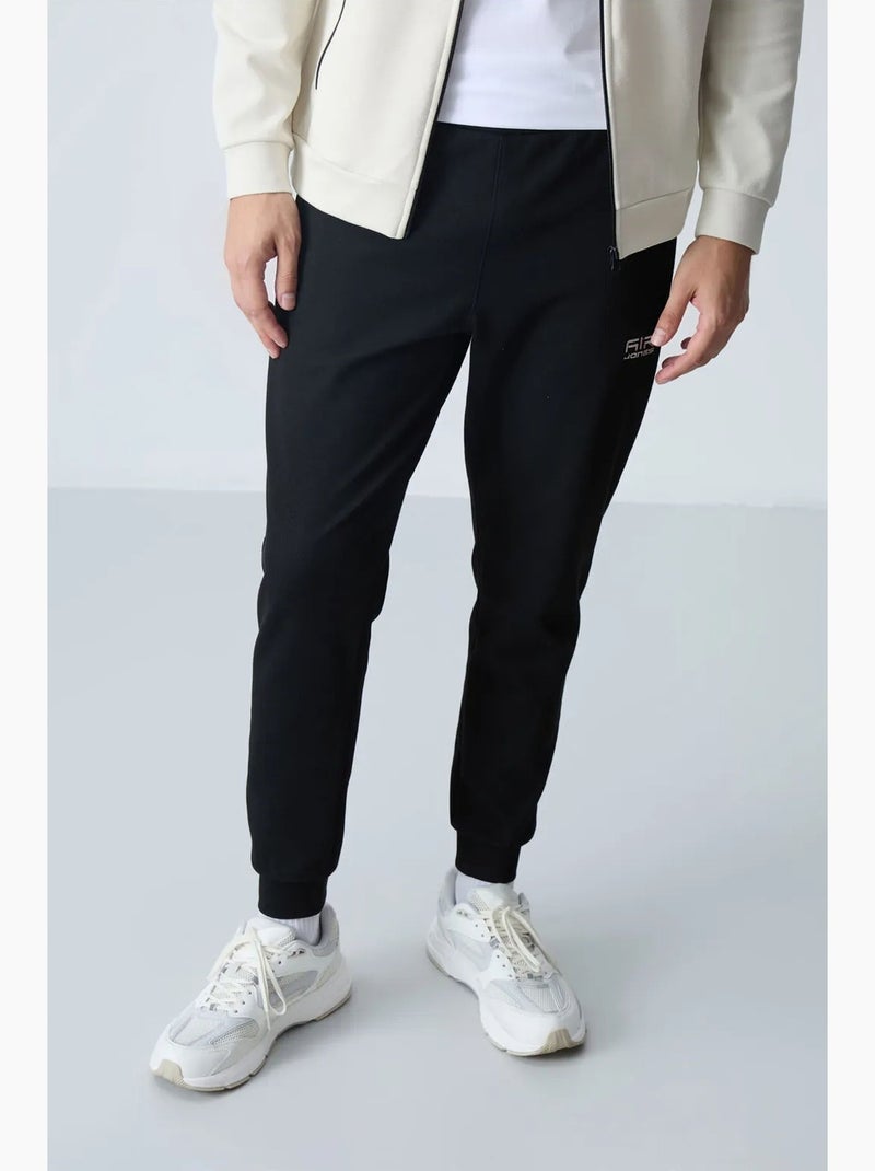 Set da uomo di felpa in pile e pantaloni tommy Avorio - Kiabi