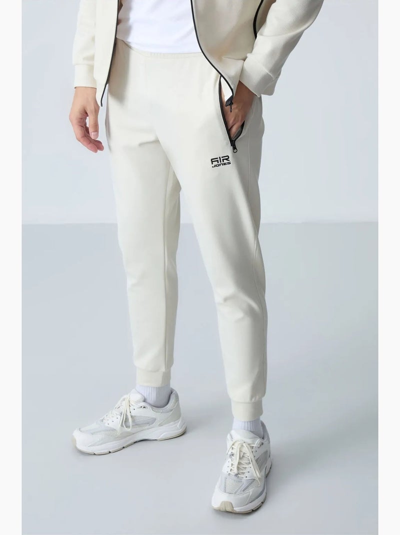 Set da uomo di felpa in pile e pantaloni tommy Crema - Kiabi