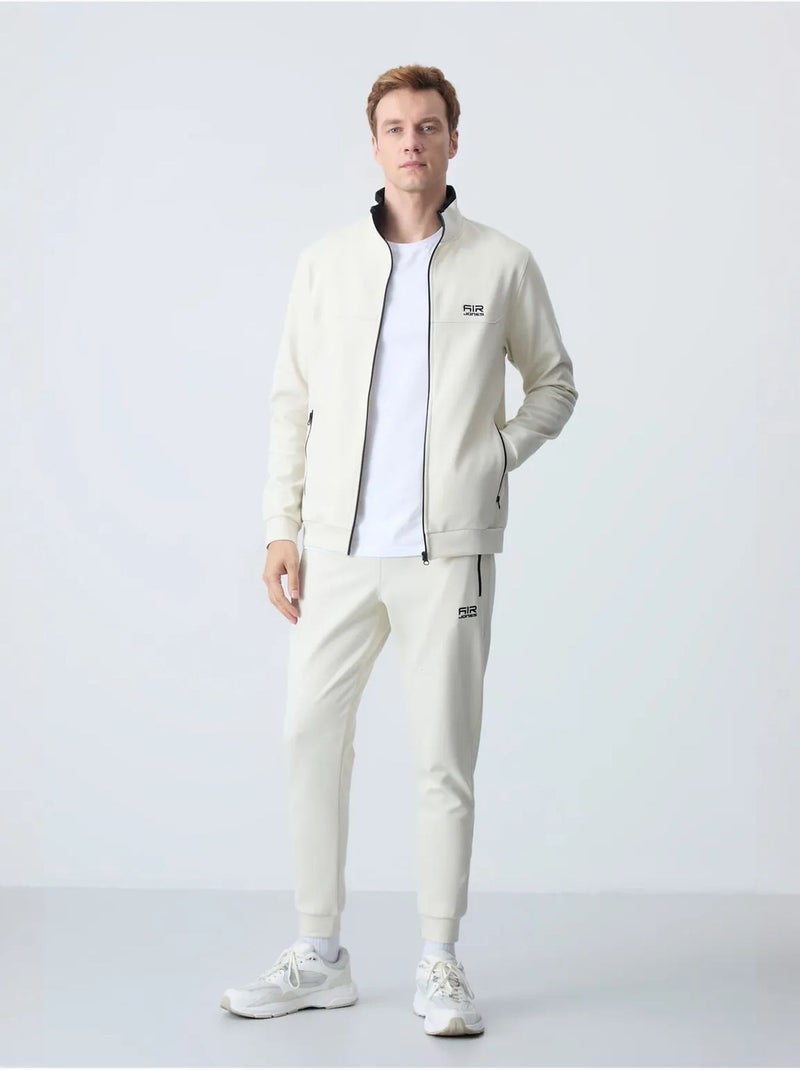 Set da uomo di felpa in pile e pantaloni tommy Crema - Kiabi