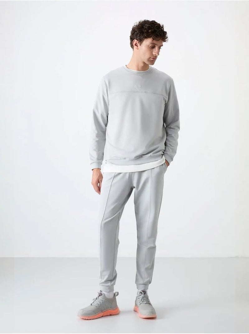 Set da uomo di felpa in pile e pantaloni tommy Grigio chiaro - Kiabi