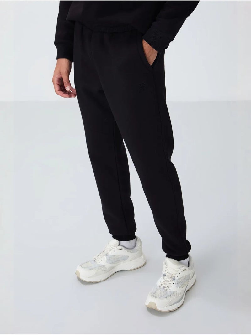 Set da uomo in felpa di pile cotone-poliestere con sweatshirt e pantaloni tommy Nero - Kiabi