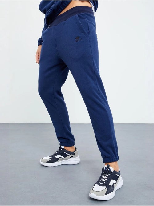 Set da uomo in poliestere con felpa e pantaloni tommy - Kiabi Set da uomo in poliestere con felpa e pantaloni tommy - Kiabi