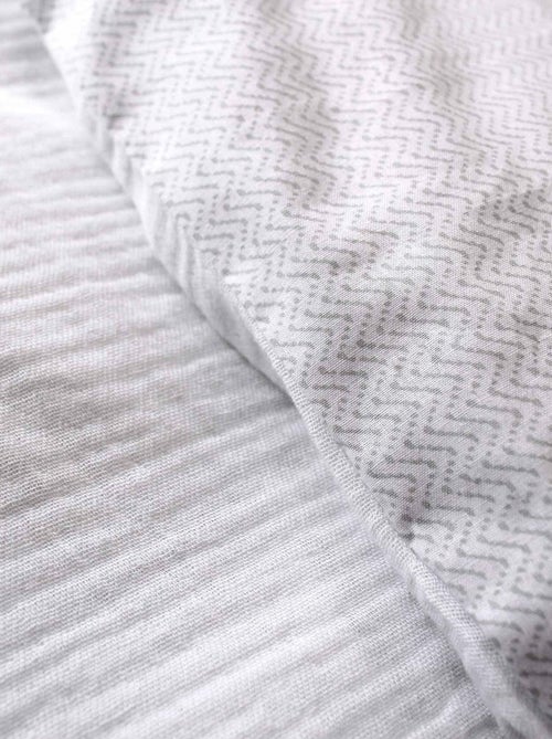 Set di biancheria da letto geometrica reversibile - Kiabi Set di biancheria da letto geometrica reversibile - Kiabi