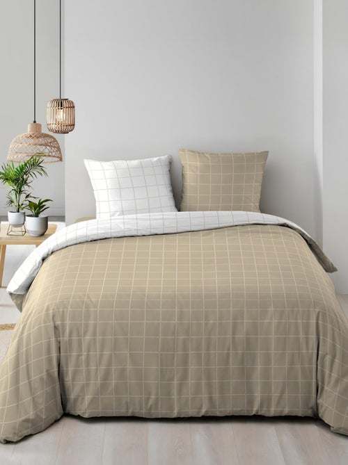 Set di biancheria da letto reversibile in cotone a quadri - Kiabi Set di biancheria da letto reversibile in cotone a quadri - Kiabi