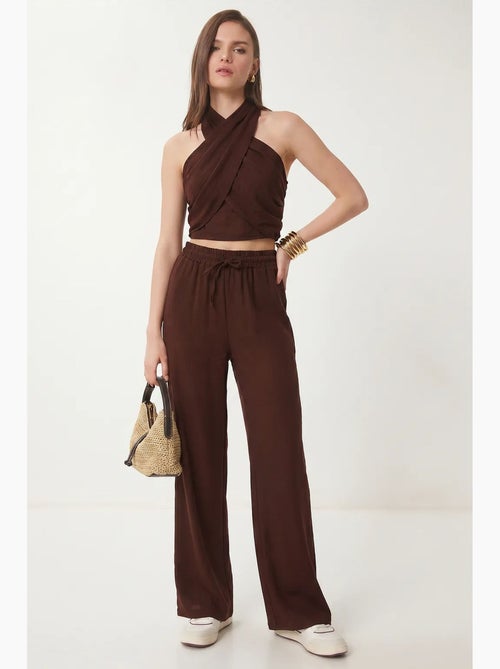 Set di blusa allacciata al collo e pantaloni a gamba larga istanbul - Kiabi Set di blusa allacciata al collo e pantaloni a gamba larga istanbul - Kiabi