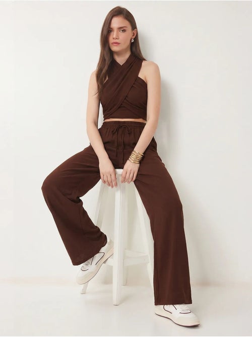 Set di blusa allacciata al collo e pantaloni a gamba larga istanbul - Kiabi Set di blusa allacciata al collo e pantaloni a gamba larga istanbul - Kiabi