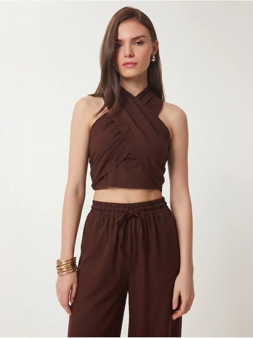 Set di blusa allacciata al collo e pantaloni a gamba larga istanbul - Kiabi Set di blusa allacciata al collo e pantaloni a gamba larga istanbul - Kiabi