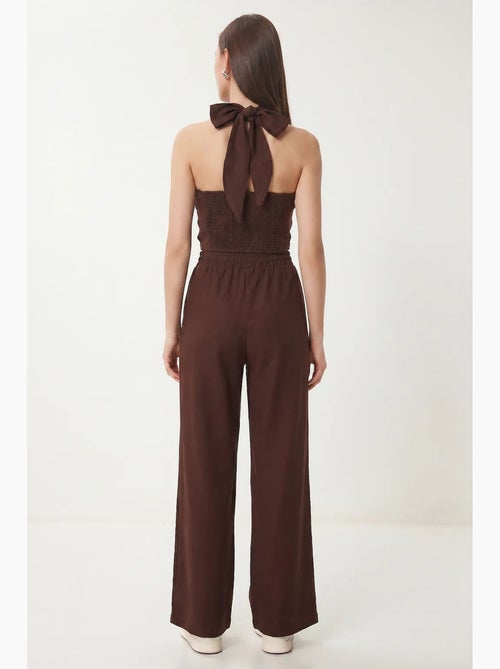 Set di blusa allacciata al collo e pantaloni a gamba larga istanbul - Kiabi Set di blusa allacciata al collo e pantaloni a gamba larga istanbul - Kiabi