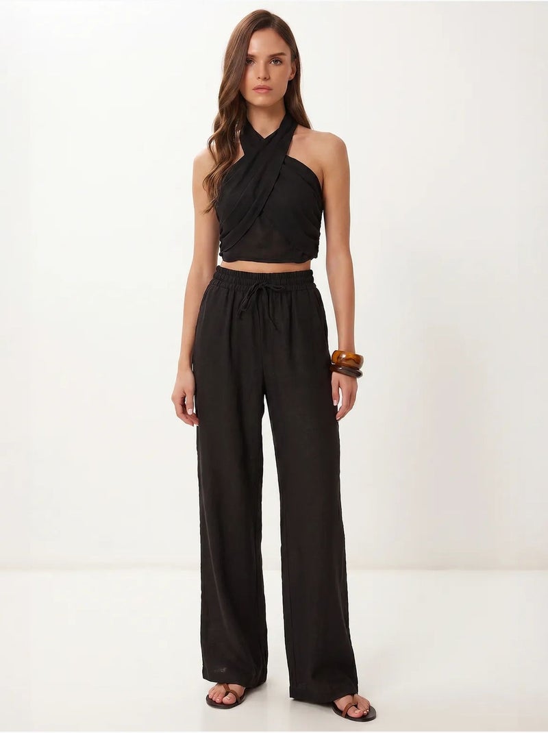 Set di blusa allacciata al collo e pantaloni a gamba larga istanbul Nero - Kiabi
