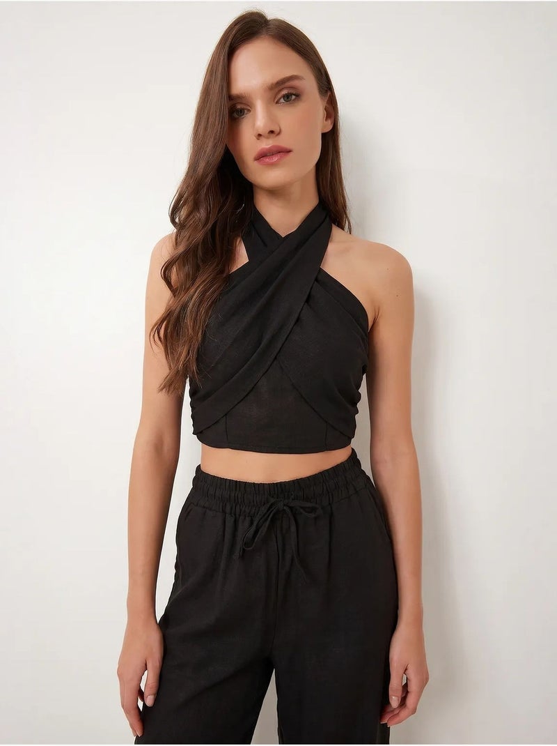 Set di blusa allacciata al collo e pantaloni a gamba larga istanbul Nero - Kiabi