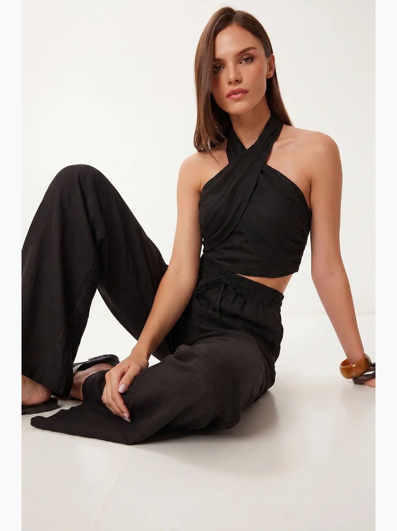 Set di blusa allacciata al collo e pantaloni a gamba larga istanbul Nero - Kiabi