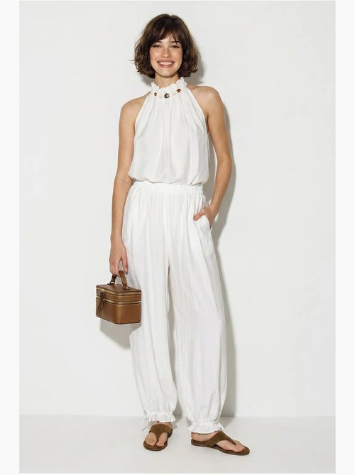 Set di blusa allacciata al collo e pantaloni a vita alta lucci - Kiabi Set di blusa allacciata al collo e pantaloni a vita alta lucci - Kiabi