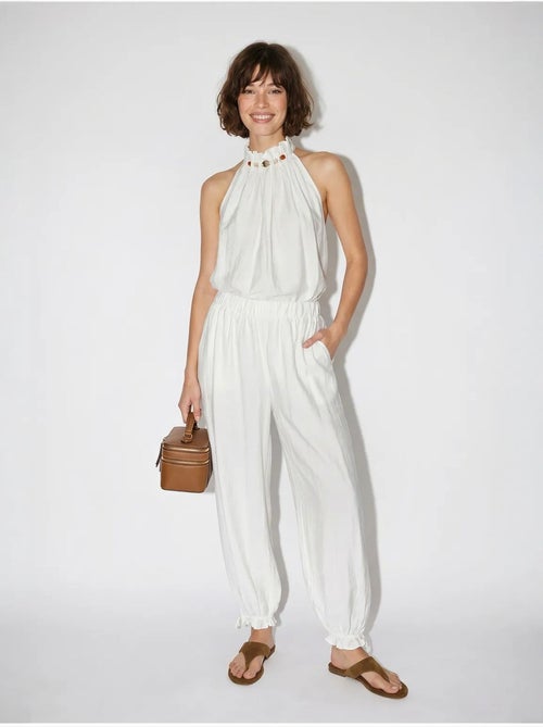 Set di blusa allacciata al collo e pantaloni a vita alta lucci - Kiabi Set di blusa allacciata al collo e pantaloni a vita alta lucci - Kiabi