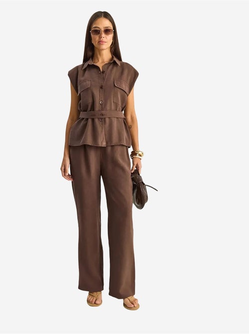 Set di blusa senza maniche con cintura e pantaloni a gamba ampia lucci - Kiabi Set di blusa senza maniche con cintura e pantaloni a gamba ampia lucci - Kiabi