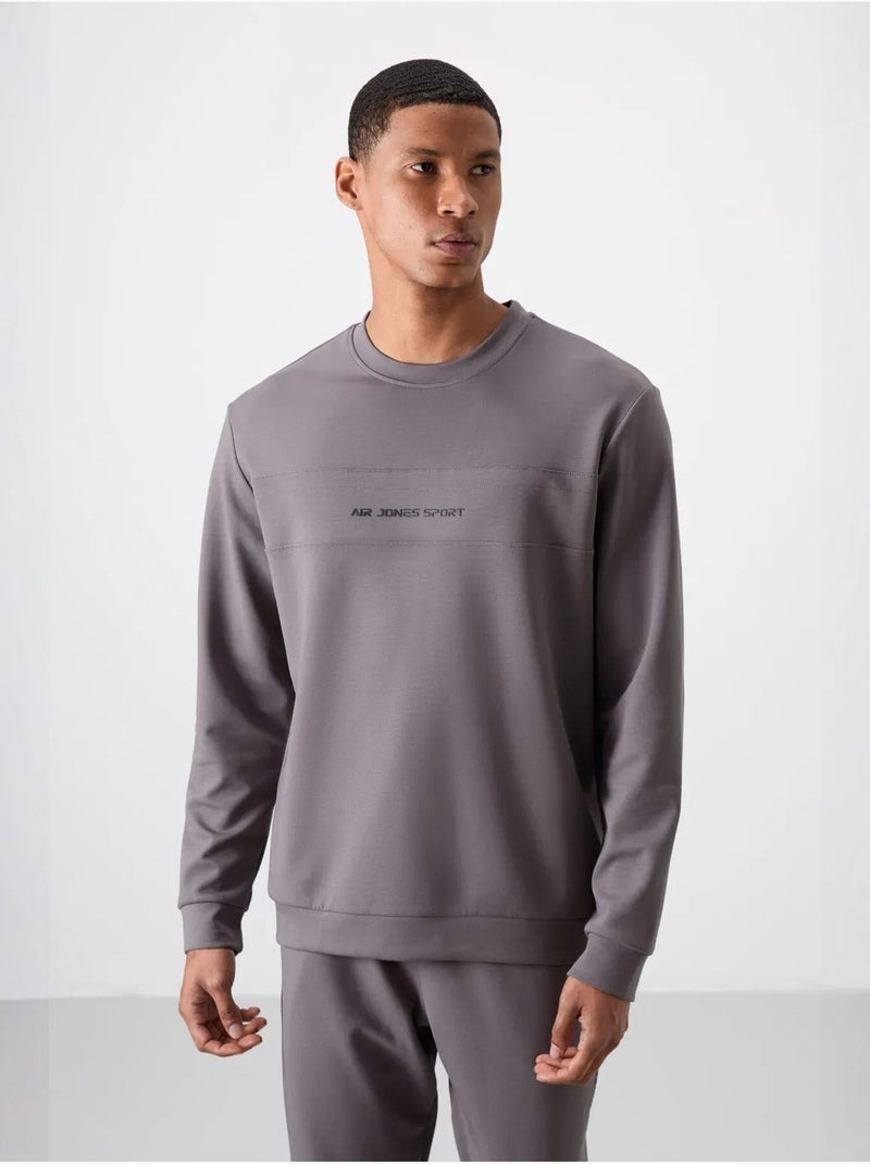 Set di felpa e pantaloni in pile stampati tommy Grigio - Kiabi