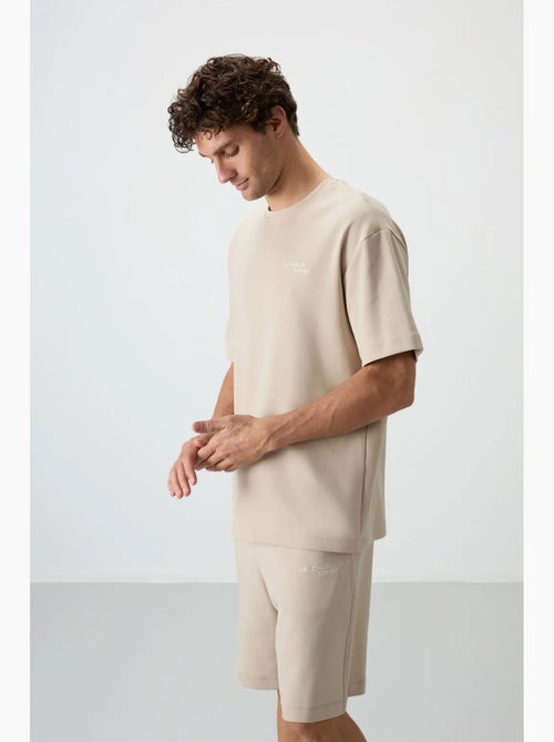 Set di t-shirt a maniche corte oversize e shorts tommy - Kiabi Set di t-shirt a maniche corte oversize e shorts tommy - Kiabi