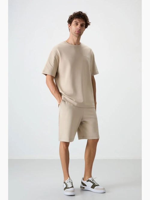 Set di t-shirt a maniche corte oversize e shorts tommy - Kiabi Set di t-shirt a maniche corte oversize e shorts tommy - Kiabi