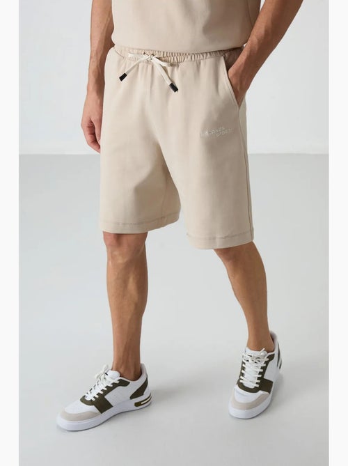 Set di t-shirt a maniche corte oversize e shorts tommy - Kiabi Set di t-shirt a maniche corte oversize e shorts tommy - Kiabi