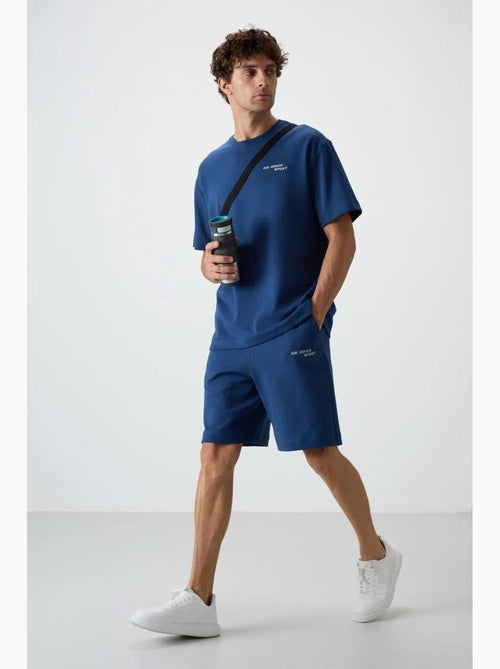 Set di t-shirt a maniche corte oversize e shorts tommy - Kiabi Set di t-shirt a maniche corte oversize e shorts tommy - Kiabi