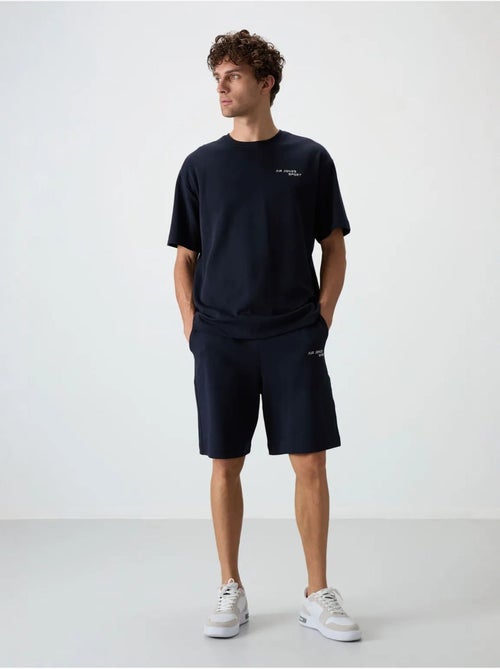 Set di t-shirt a maniche corte oversize e shorts tommy - Kiabi Set di t-shirt a maniche corte oversize e shorts tommy - Kiabi