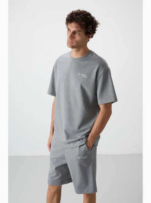 Set di t-shirt a maniche corte oversize e shorts tommy - Kiabi Set di t-shirt a maniche corte oversize e shorts tommy - Kiabi