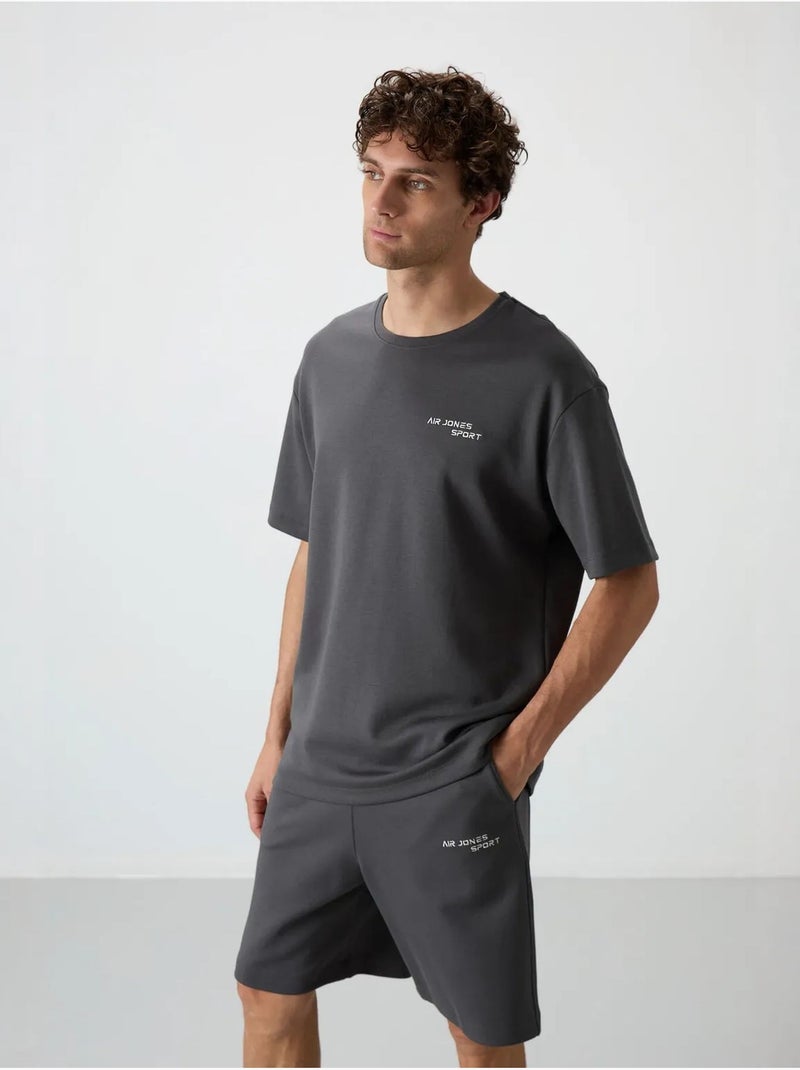 Set di t-shirt a maniche corte oversize e shorts tommy Grigio nero - Kiabi