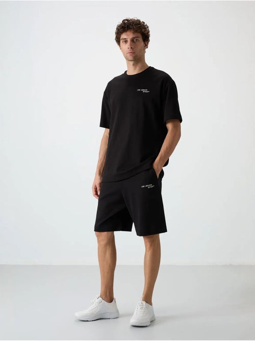 Set di t-shirt a maniche corte oversize e shorts tommy - Kiabi Set di t-shirt a maniche corte oversize e shorts tommy - Kiabi