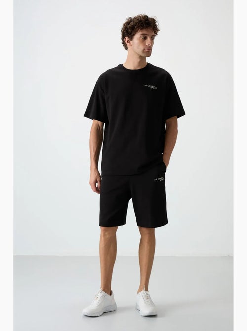 Set di t-shirt a maniche corte oversize e shorts tommy - Kiabi Set di t-shirt a maniche corte oversize e shorts tommy - Kiabi