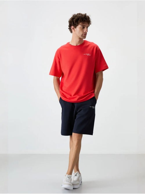 Set di t-shirt a maniche corte oversize e shorts tommy - Kiabi Set di t-shirt a maniche corte oversize e shorts tommy - Kiabi