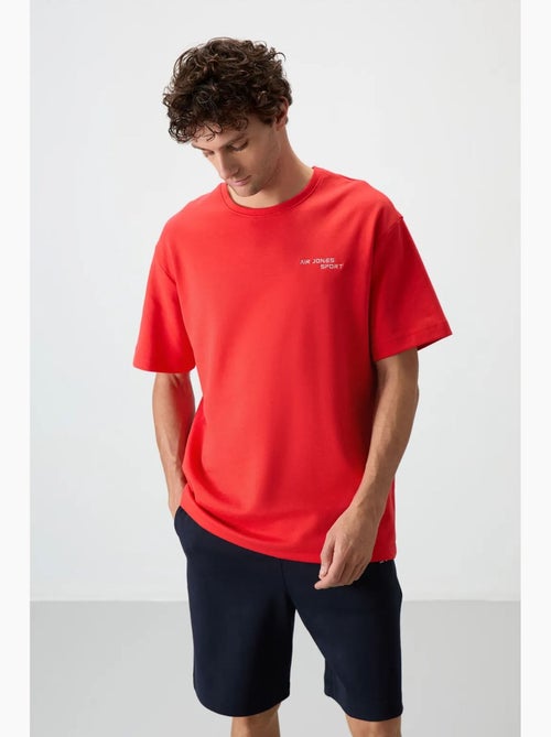 Set di t-shirt a maniche corte oversize e shorts tommy - Kiabi Set di t-shirt a maniche corte oversize e shorts tommy - Kiabi