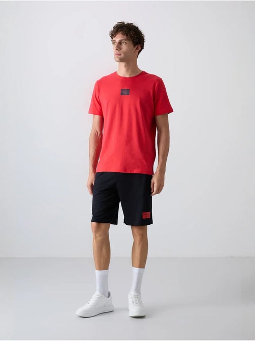 Set di t-shirt e shorts in jersey di cotone stampato tommy - Kiabi