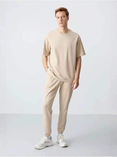 Set di t-shirt oversize e pantaloni da uomo tommy - Kiabi