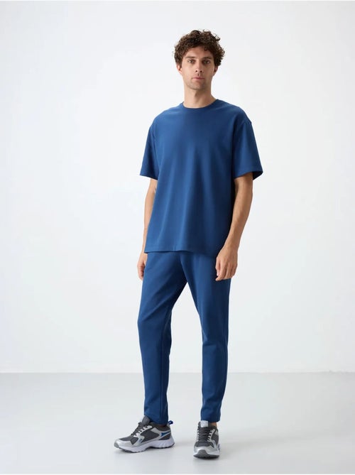 Set di t-shirt oversize e pantaloni da uomo tommy - Kiabi Set di t-shirt oversize e pantaloni da uomo tommy - Kiabi