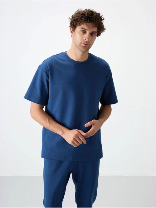Set di t-shirt oversize e pantaloni da uomo tommy - Kiabi Set di t-shirt oversize e pantaloni da uomo tommy - Kiabi