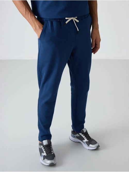 Set di t-shirt oversize e pantaloni da uomo tommy - Kiabi Set di t-shirt oversize e pantaloni da uomo tommy - Kiabi