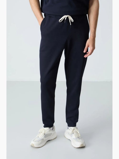 Set di t-shirt oversize e pantaloni da uomo tommy - Kiabi Set di t-shirt oversize e pantaloni da uomo tommy - Kiabi