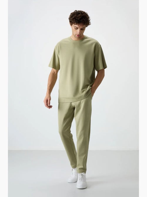 Set di t-shirt oversize e pantaloni da uomo tommy - Kiabi Set di t-shirt oversize e pantaloni da uomo tommy - Kiabi