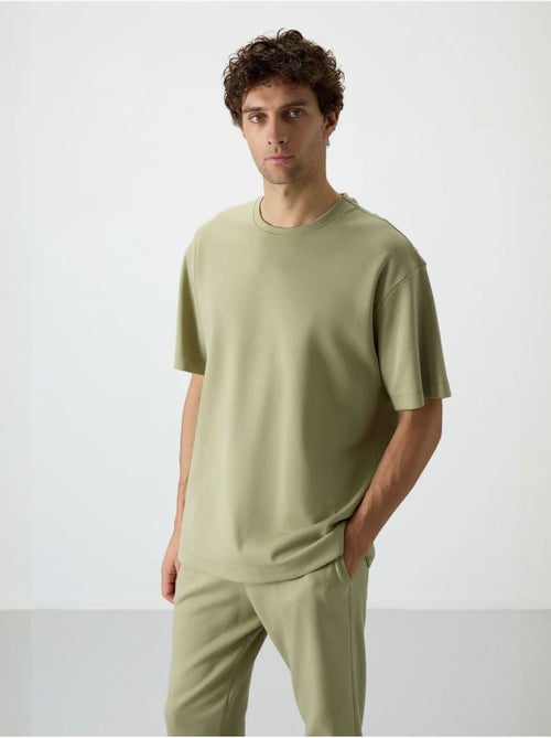 Set di t-shirt oversize e pantaloni da uomo tommy - Kiabi Set di t-shirt oversize e pantaloni da uomo tommy - Kiabi