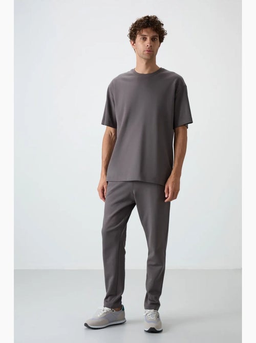 Set di t-shirt oversize e pantaloni da uomo tommy - Kiabi Set di t-shirt oversize e pantaloni da uomo tommy - Kiabi