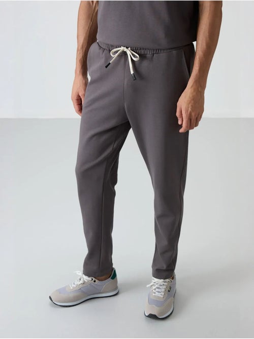 Set di t-shirt oversize e pantaloni da uomo tommy - Kiabi Set di t-shirt oversize e pantaloni da uomo tommy - Kiabi